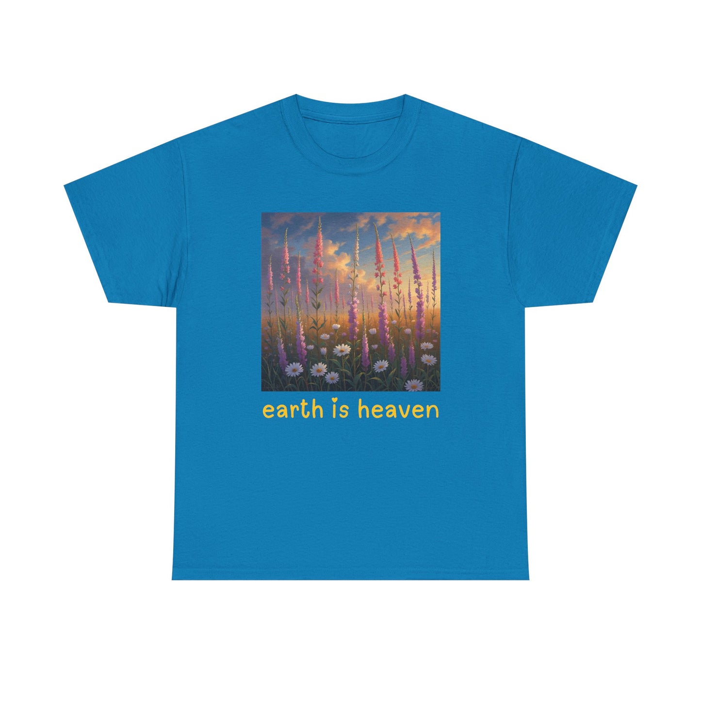 Blue t-shirt with a graphic of tall grasses and 'earth is heaven' text on a white background