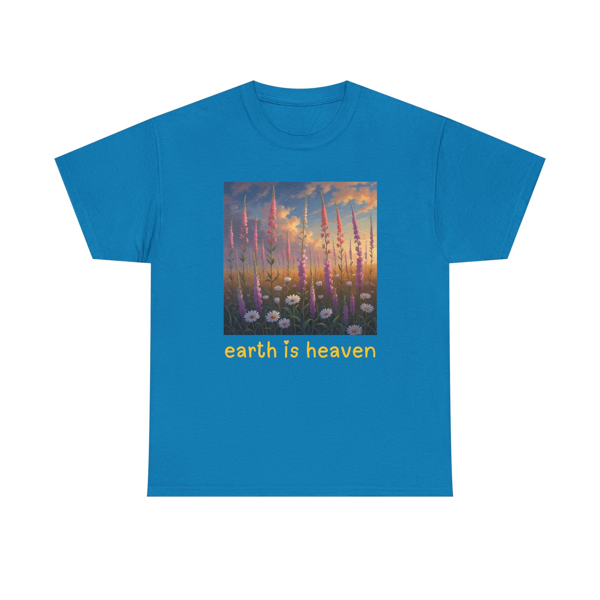 Blue t-shirt with a graphic of tall grasses and 'earth is heaven' text on a white background